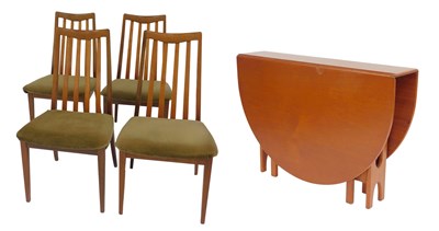 Lot 802 - A G-Plan teak oval drop leaf table, with...