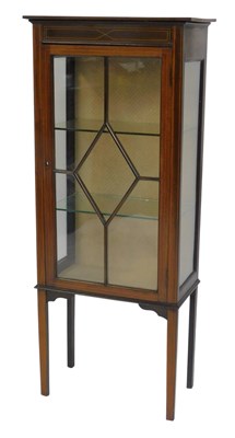Lot 812 - An Edwardian mahogany display cabinet, the top...