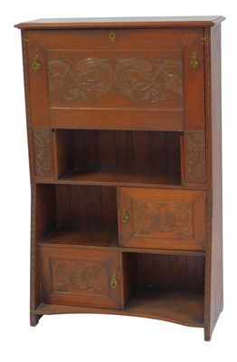 Lot 830 - An early 20thC oak escritoire, the top with a...
