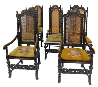 Lot 577 - A set of eight oak Carolean style dining...
