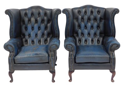 Lot 841 - A pair of blue leather Chesterfield buttoned...