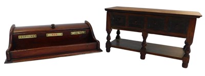 Lot 175 - An oak cigarette box modelled as a miniature...