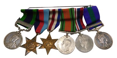 Lot 272 - A group of British medals, consisting of an...