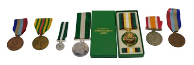 Lot 328 - A collection of medals, to include the...