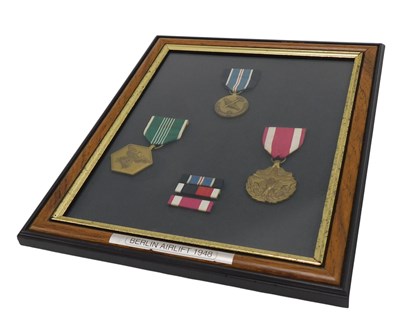 Lot 329 - A framed group of medals and medal...