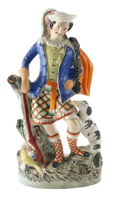 Lot 113 - A late 19thC Staffordshire flatback figure of...