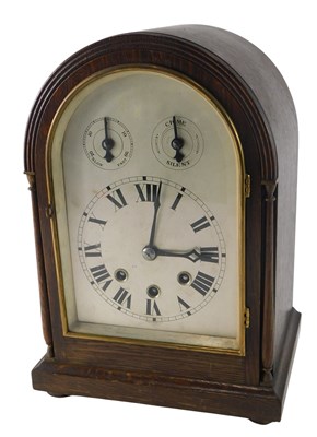 Lot 122 - An early 20thC German oak cased mantel...