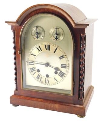 Lot 125 - An Edwardian mahogany cased mantel clock, the...