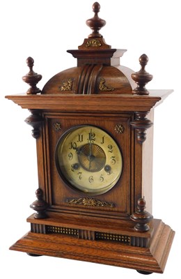 Lot 131 - A late 19thC German mantel clock, in a walnut...