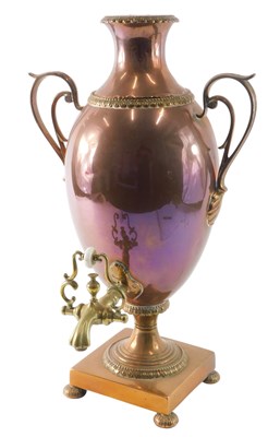 Lot 134 - A late 19thC brass and copper vase shaped two...