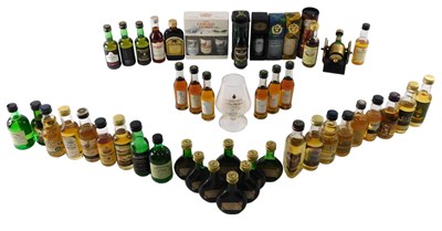 Lot 139 - A collection of miniature bottles of whisky,...