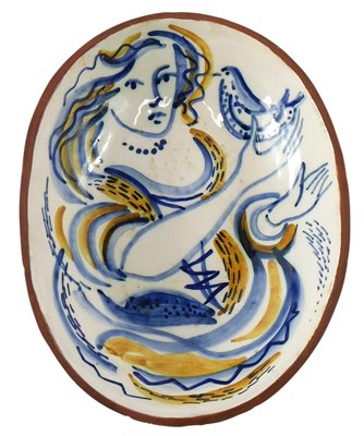 Lot 150 - A studio ceramic oval dish, decorated with a...