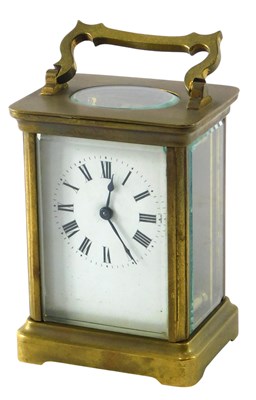 Lot 160 - A French brass carriage time piece, with white...