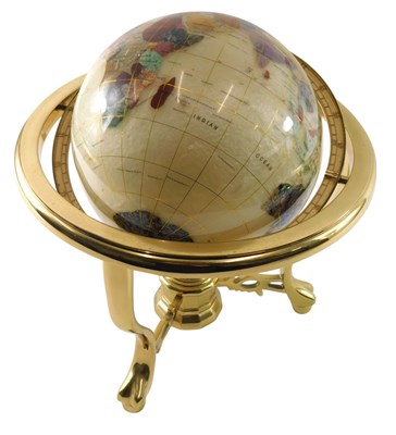 Lot 170 - A lacquered brass table globe, inset with semi-...