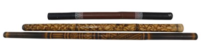 Lot 219 - Three decorated Aboriginal souvenir didgeridoos.
