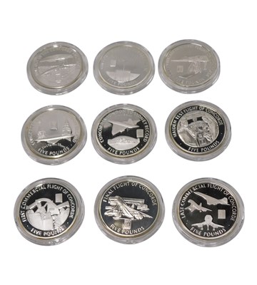Lot 371 - A set of nine silver five pound Concord...