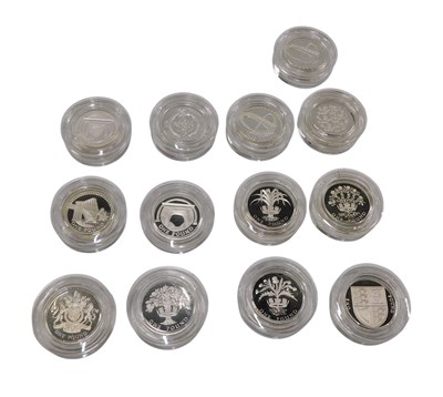 Lot 382 - A collection of thirteen United Kingdom silver...