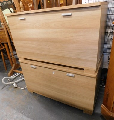 Lot 1532 - Two light oak effect storage cupboards, on...
