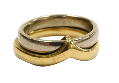 Lot 305 - A bi-colour double linked band, comprising a...