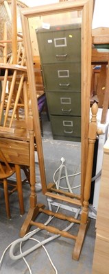 Lot 1533 - A pine cheval rectangular bedroom mirror,...