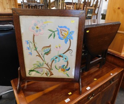 Lot 1547 - An oak gate leg side table, and an oak fire...