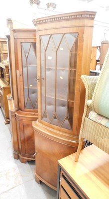 Lot 1535 - A late 20thC oak corner cabinet, consisting of...