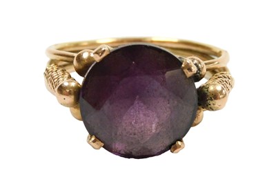Lot 317 - An Egyptian rose gold and imitation...