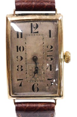 Lot 302 - A mid century gentleman's 9ct gold cased tank...