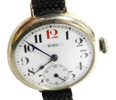 Lot 320 - A WWI period gentleman's wristwatch, circular...