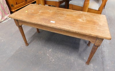 Lot 1559 - An oak coffee table, 46cm high, 91cm wide,...