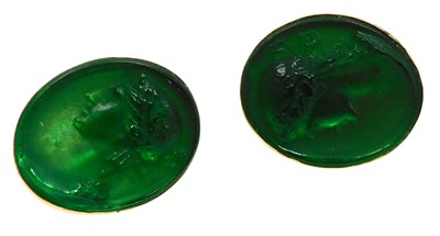 Lot 330 - A pair of green glass cameo cufflinks, bust...