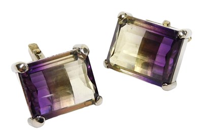 Lot 325 - A pair of ametrine cufflinks, the faceted,...