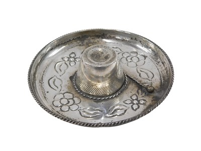 Lot 515 - A white metal pin tray, modelled as a South...