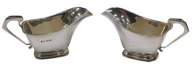 Lot 286 - A pair of George VI Art Deco small sauce boats,...