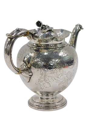 Lot 287 - A Victorian silver teapot, with engraved...