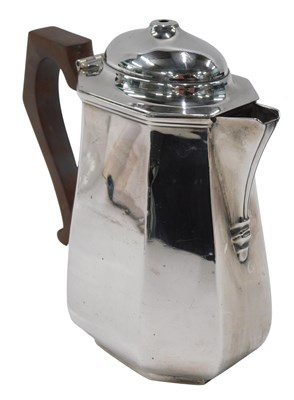 Lot 522 - A George V silver hot water jug, of...