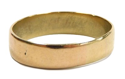 Lot 327 - A wedding band, yellow metal, unmarked, size S,...