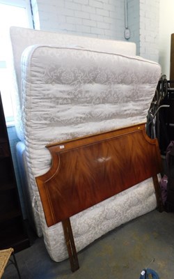 Lot 1569 - A double bed, with mattress, bases and a...