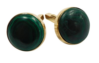 Lot 337 - A pair of cabochon malachite cufflinks, in...
