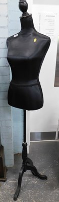 Lot 1579 - A dress maker's dummy or mannekin, on tripod...
