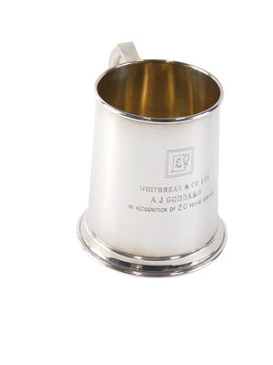 Lot 531 - An Elizabeth II silver mug, of plain form,...