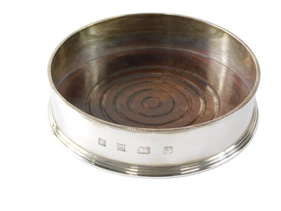 Lot 536 - An Elizabeth II silver and mahogany wine...
