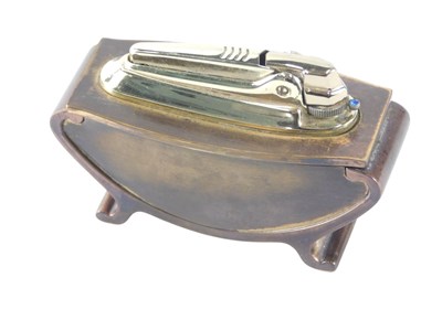 Lot 544 - A Ronson gilt finished lighter, in Art Deco...