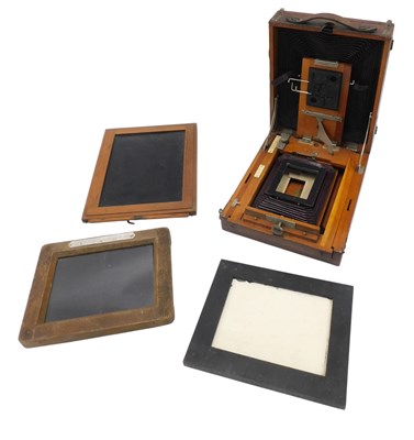Lot 570 - A brown and black leatherette plate...
