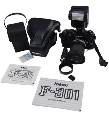 Lot 573 - A Nikon F300 camera, with lens, and autofocus...