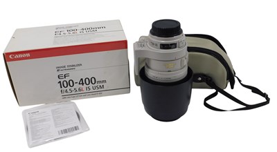 Lot 574 - A Canon EF 100-400mm lens, in original box.