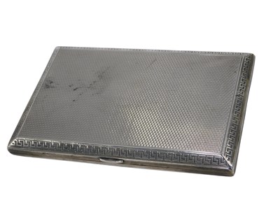 Lot 584 - A George V silver engine turned cigarette case,...