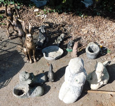 Lot 1652 - Various garden ornaments, to include three...