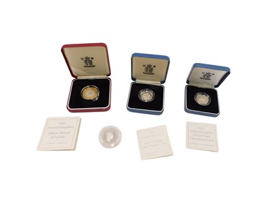 Lot 736 - A silver 1986 two pound coin, a 1997 silver...