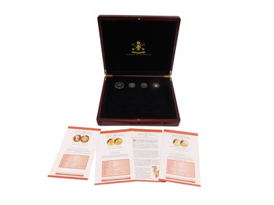Lot 749 - Four World's Finest Gold Miniatures coins, all...